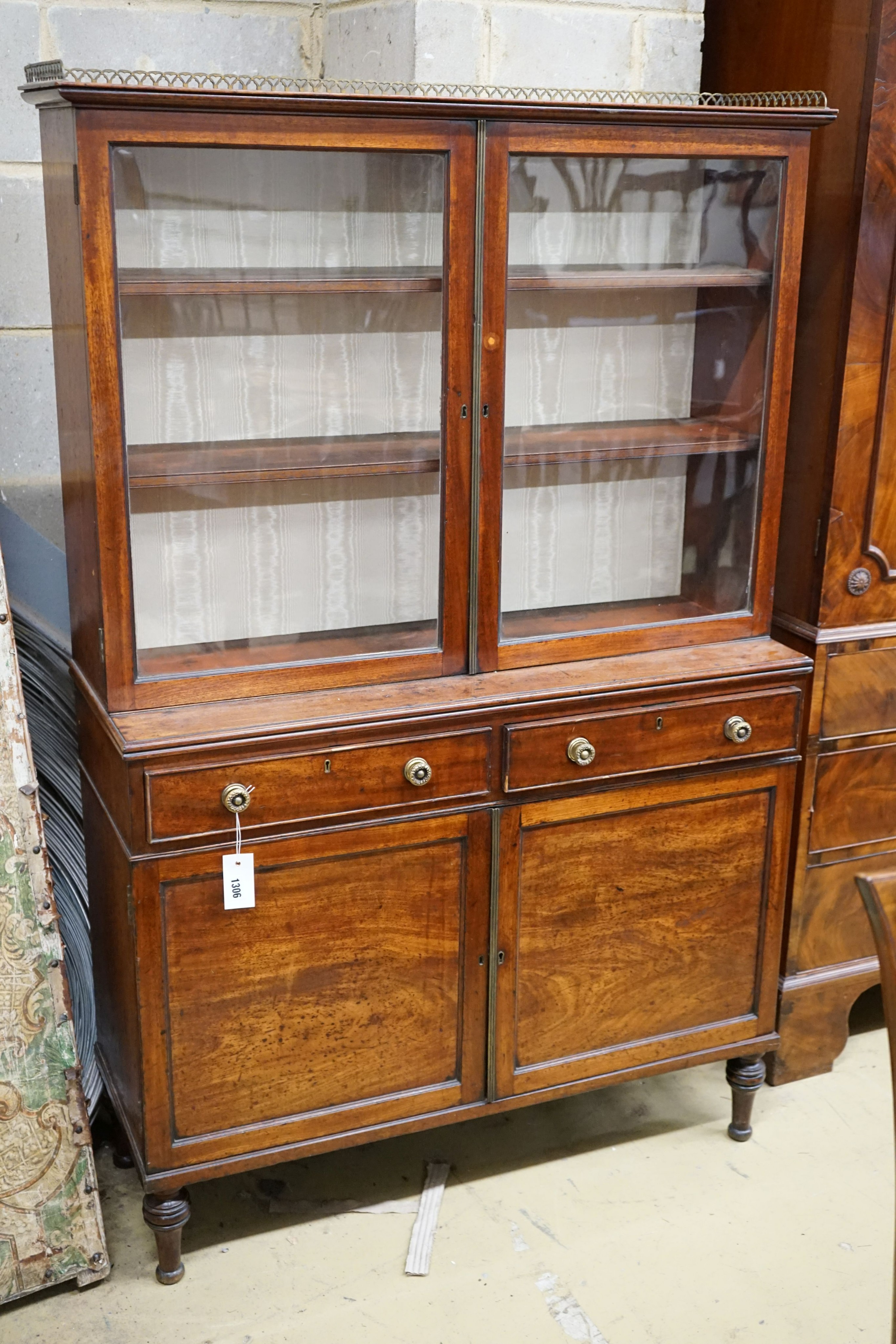 A small Regency glazed mahogany side cabinet, width 92cm, depth 33cm, height 147cm